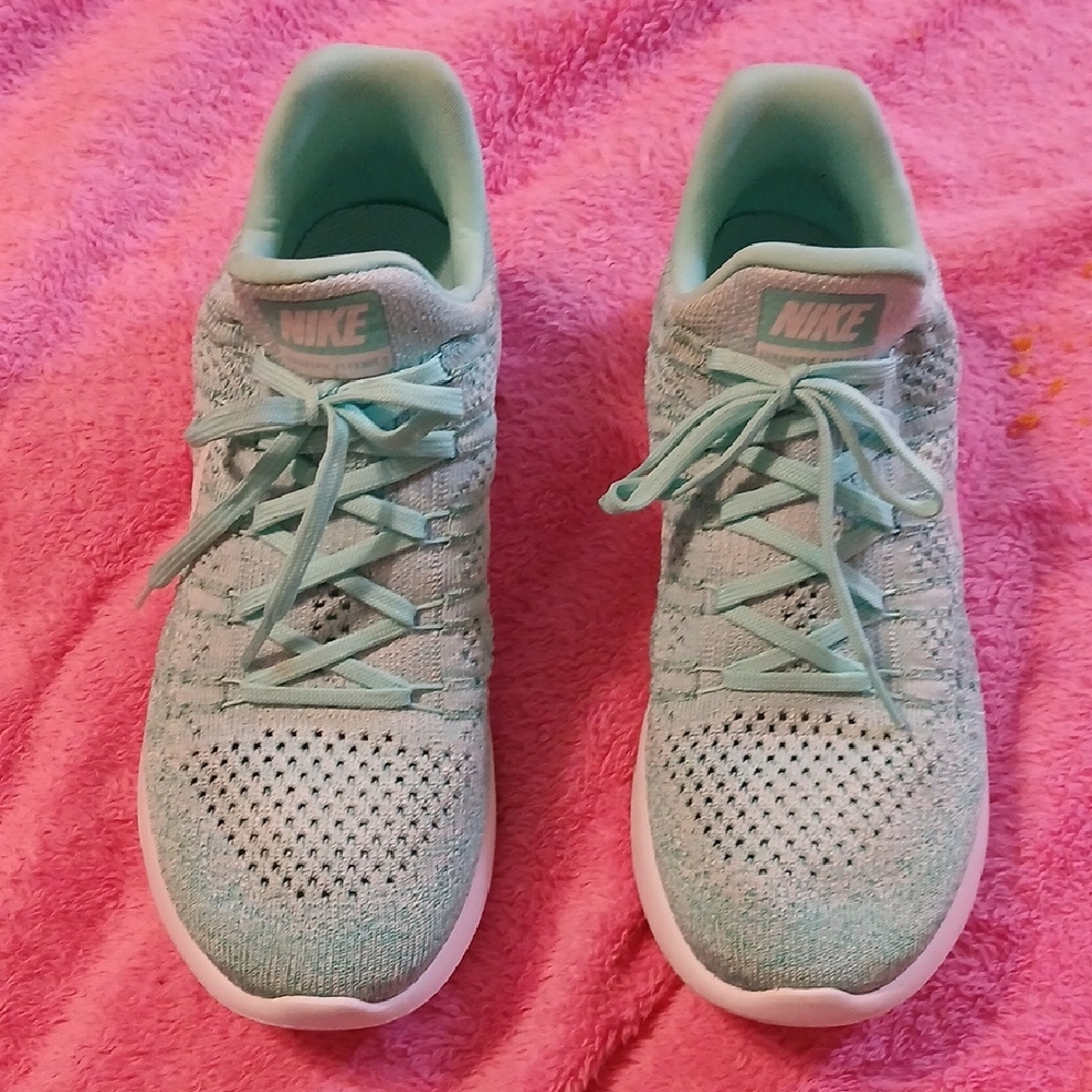 Nike Women's Mint Green Flyknit Running Shoes